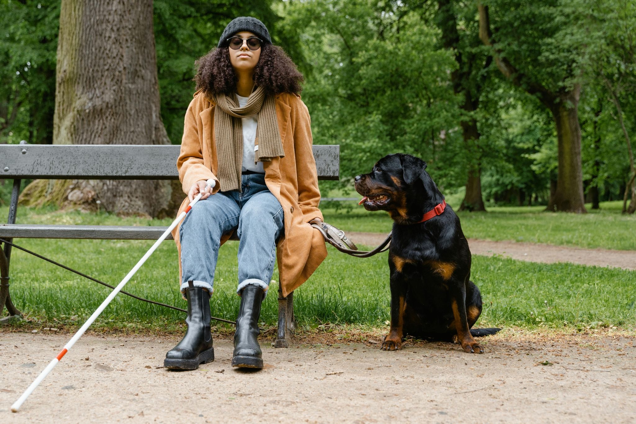 women sitting with her dog